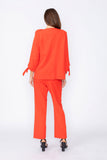 Coral Jacket With Knotted Sleeves